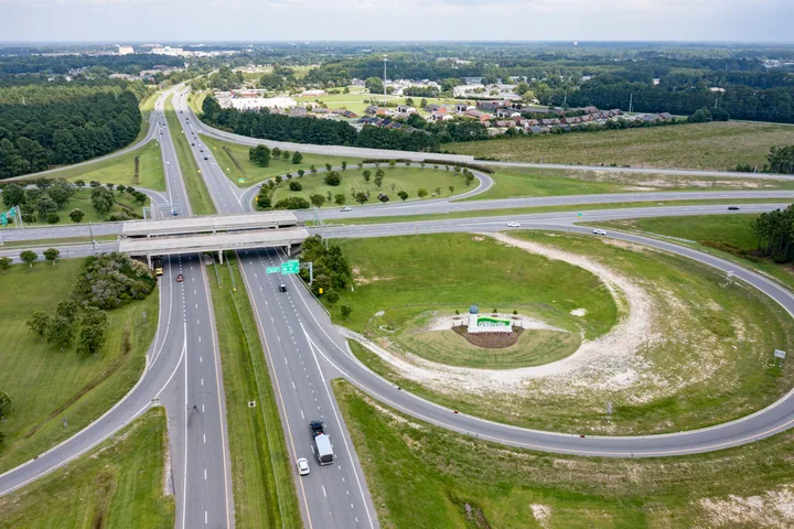 Aerial view of the I-587 gateway interchange and surrounding Greenville landscape in August 2024